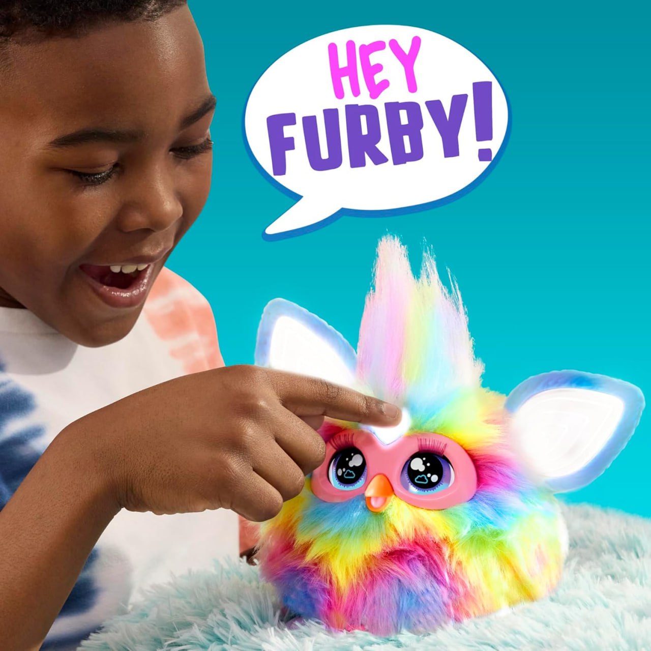 Furby Tie Dye — интерактивная мягкая игрушка с 15 модными аксессуарами. Подходит для девочек и мальчиков от 6 лет. Аниматроник с голосовым управлением для увлекательной игры и общения